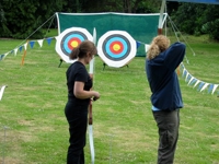 Mobile longbow and crossbow archery instruction for events